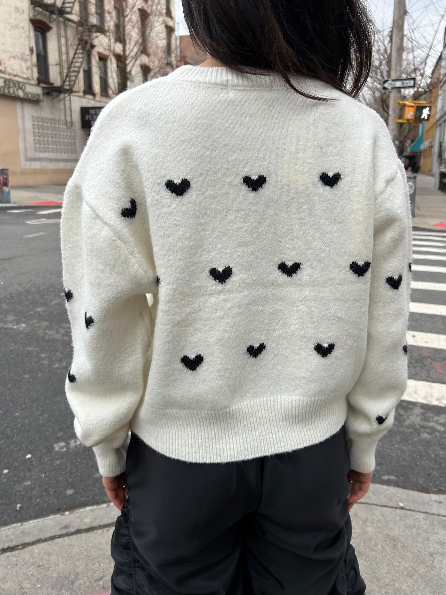 all over heart sweater