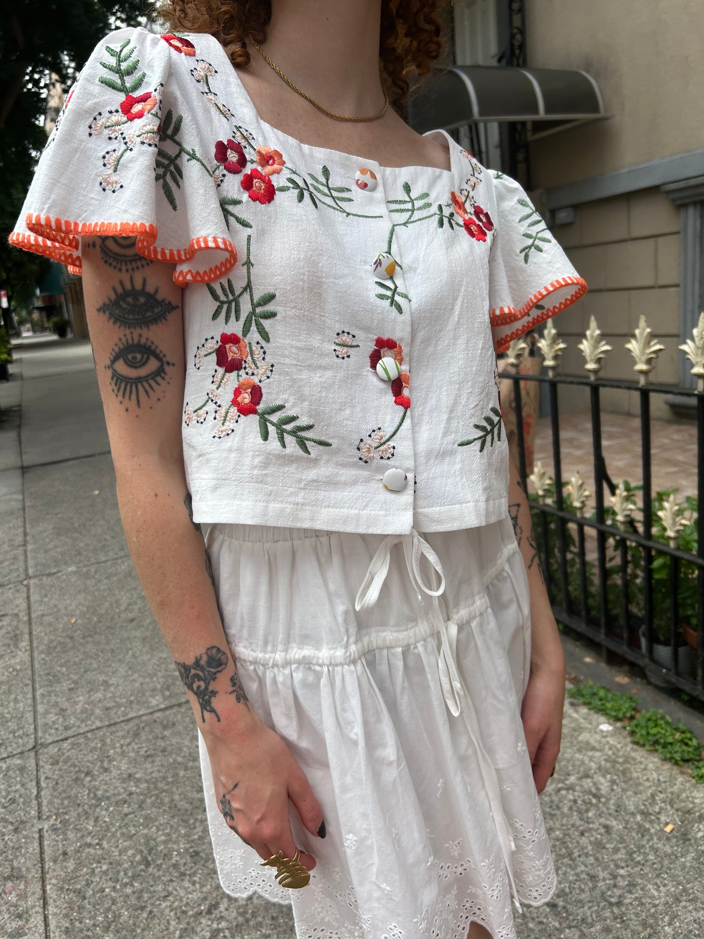 embroidered floral blouse