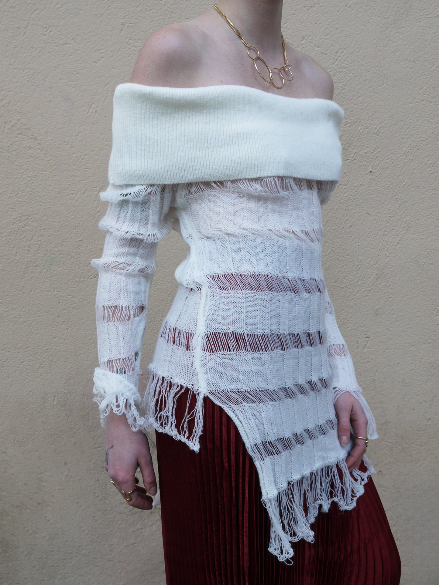 off shoulder tassle sweater