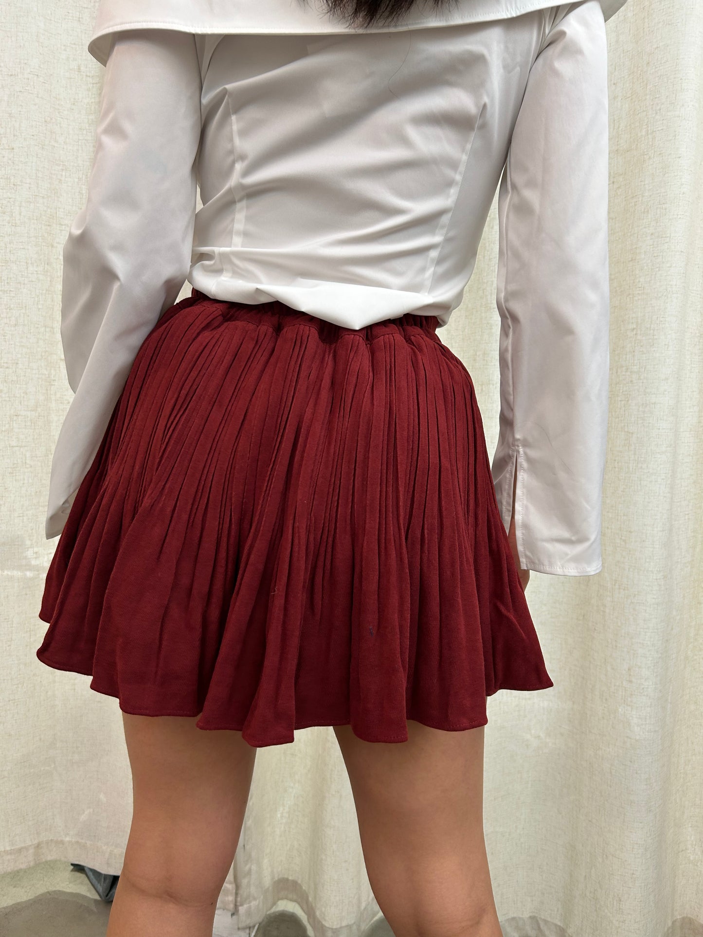 short pleated skirt