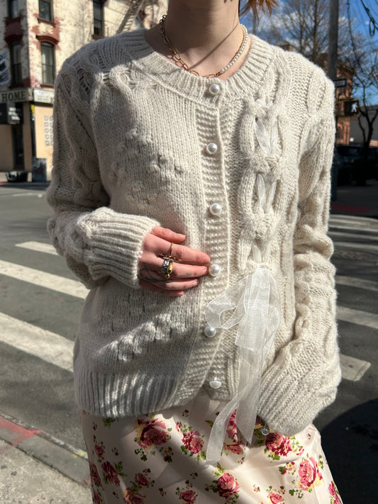 cable knit pearl button cardigan